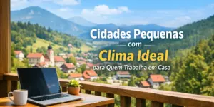 Varanda com laptop e vista para casas com telhados vermelhos nas montanhas