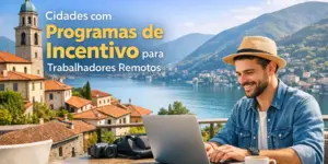 Homem trabalhando remotamente à beira de um lago com montanhas ao fundo