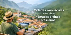 Pessoa trabalhando em laptop ao ar livre com vista para cidade em montanhas verdes, 2026.