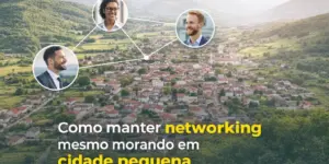 Vista aérea de cidade pequena com retratos interligados simbolizando networking